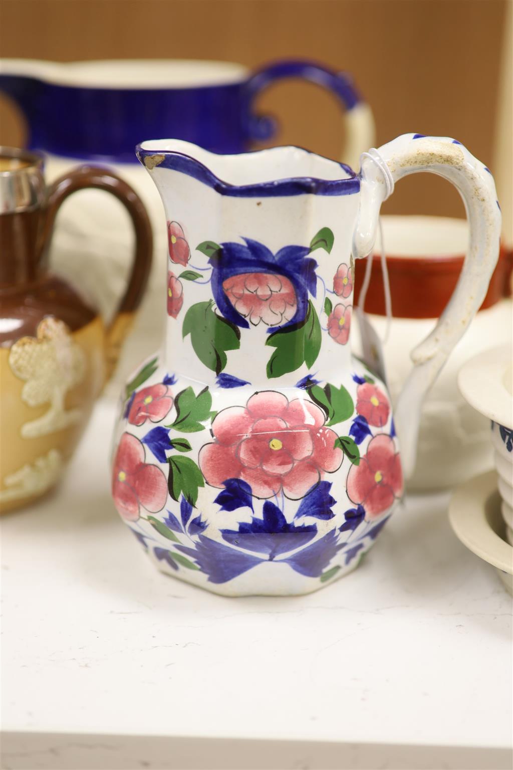 A Royal Doulton Lambeth silver rimmed jug and other various jugs including Copeland, lustreware etc.